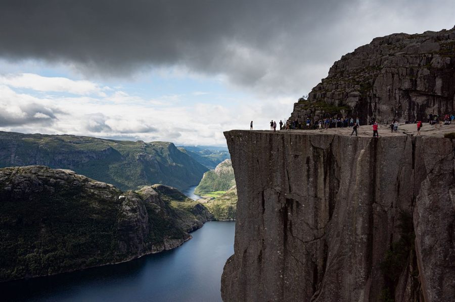 Hikers on Pulpit Rock above the Lysefjord